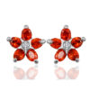 star design floral earring studs in red colour stone in pure silver