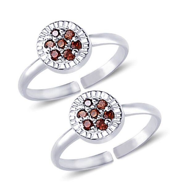 Toe ring in floral pattern with red gemstone in pure silver